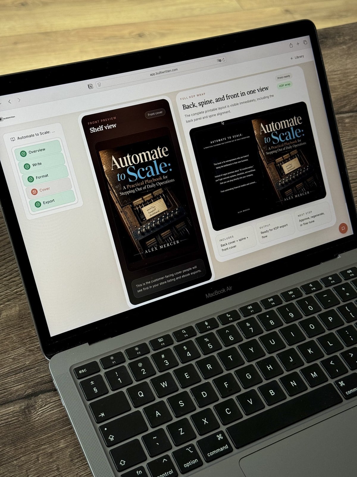 MacBook on a wooden floor displaying Built&Written book cover previews