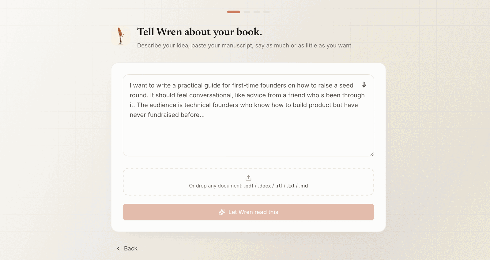 Built&Written's Tell Wren about your book screen with a text box for describing the book and an area to drop a document